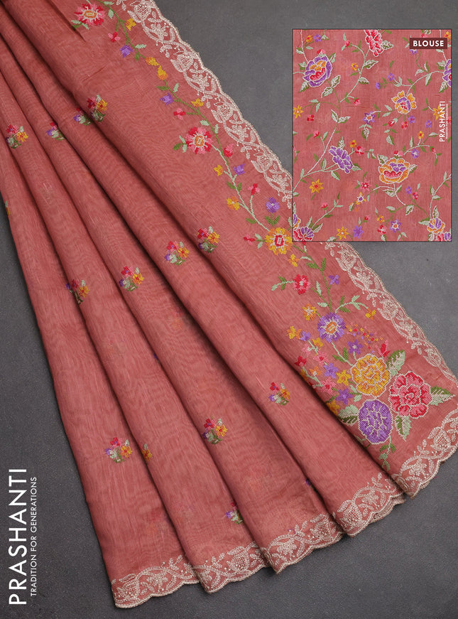 Art linen saree dark peach with allover convent embroidery buttas and embroidery border