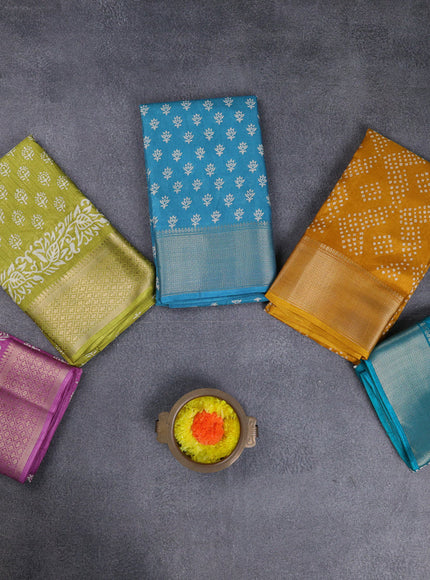 Semi dola pack of 5 multi colour and multi design with allover prints and zari woven border