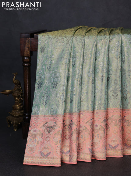 Pure kanchipuram tissue silk saree pastel blue and peach orange with allover zari woven brocade weaves and rich zari woven meenakari border