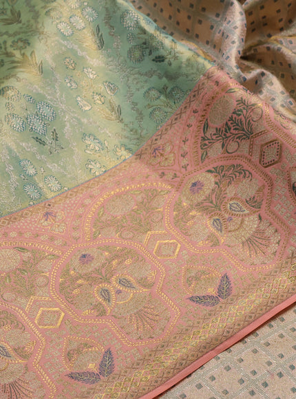 Pure kanchipuram tissue silk saree pastel blue and peach orange with allover zari woven brocade weaves and rich zari woven meenakari border