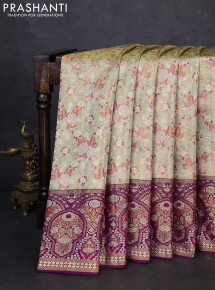 Pure kanchipuram tissue silk saree pista green and purple with allover floral zari woven brocade weaves and rich zari woven meenakari border