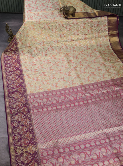 Pure kanchipuram tissue silk saree pista green and purple with allover floral zari woven brocade weaves and rich zari woven meenakari border