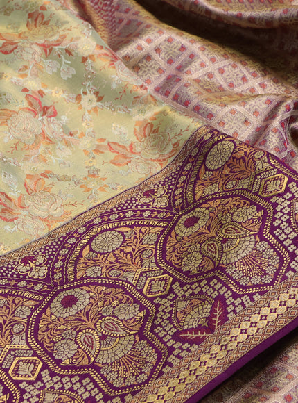 Pure kanchipuram tissue silk saree pista green and purple with allover floral zari woven brocade weaves and rich zari woven meenakari border