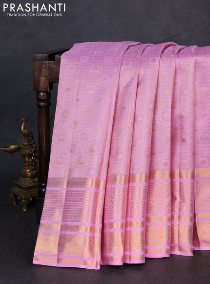 Pure kanchipuram silk saree lotus pink with allover zari woven brocade weaves and long rich zari woven border