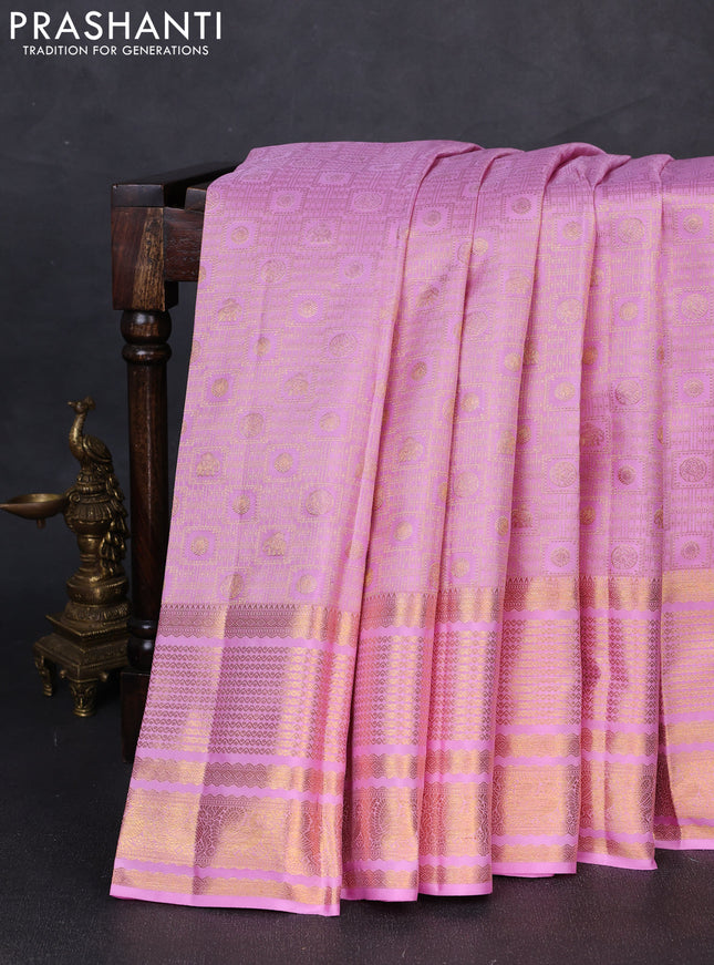 Pure kanchipuram silk saree lotus pink with allover zari woven brocade weaves and long rich zari woven border