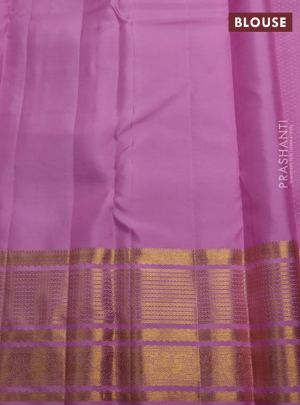 Pure kanchipuram silk saree lotus pink with allover zari woven brocade weaves and long rich zari woven border