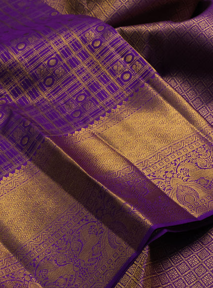 Pure kanchipuram silk saree violet with allover zari woven brocade weaves and long rich zari woven border