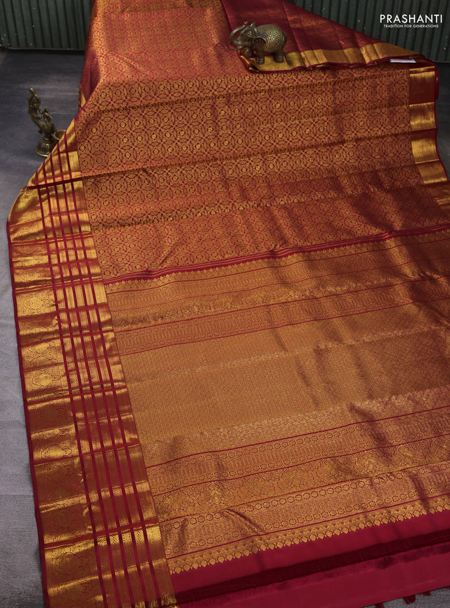 Pure kanchipuram silk saree maroon with allover zari woven brocade weaves and long rich zari woven border