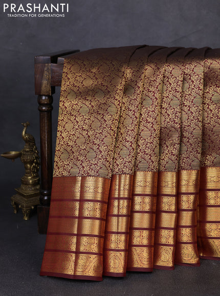 Pure kanchipuram silk saree deep maroon with allover zari woven brocade weaves and long rich zari woven border