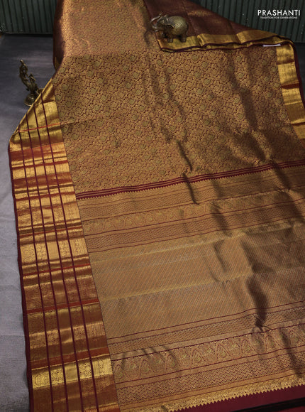 Pure kanchipuram silk saree deep maroon with allover zari woven brocade weaves and long rich zari woven border