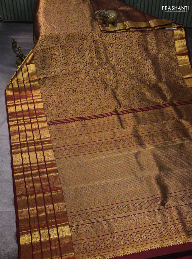 Pure kanchipuram silk saree deep maroon with allover zari woven brocade weaves and long rich zari woven border