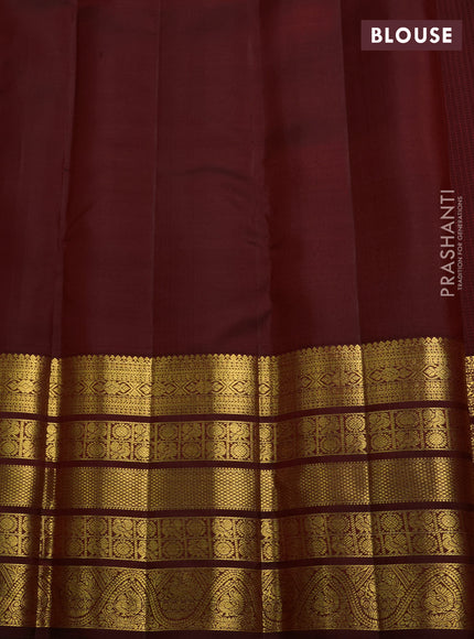 Pure kanchipuram silk saree deep maroon with allover zari woven brocade weaves and long rich zari woven border