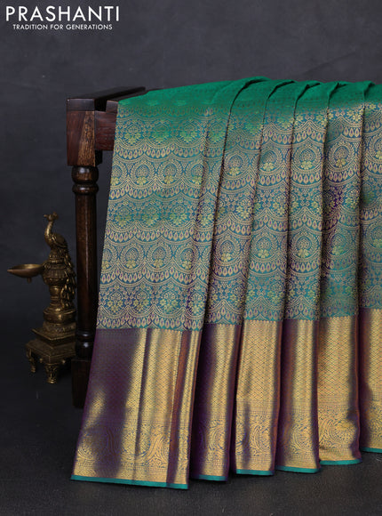Pure kanchipuram silk saree teal green with allover zari woven brocade weaves and long rich zari woven border