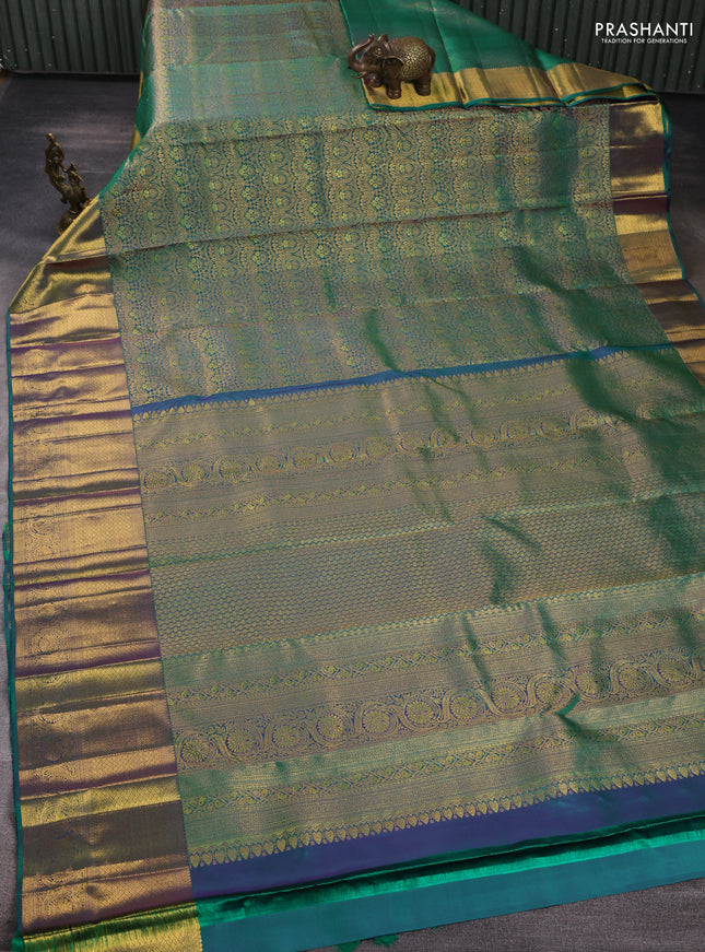 Pure kanchipuram silk saree teal green with allover zari woven brocade weaves and long rich zari woven border