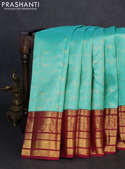 Pure kanchipuram silk saree teal blue and maroon with allover zari woven brocade weaves and long rich zari woven border