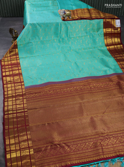 Pure kanchipuram silk saree teal blue and maroon with allover zari woven brocade weaves and long rich zari woven border