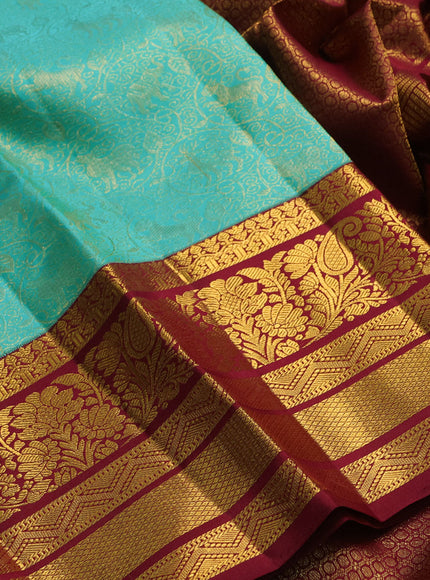 Pure kanchipuram silk saree teal blue and maroon with allover zari woven brocade weaves and long rich zari woven border