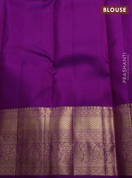 Pure kanchipuram silk saree yellow and purple with allover zari woven brocade weaves and long rich zari woven border