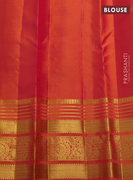 Pure kanchipuram silk saree teal green and sunset orange with allover zari woven brocade weaves and long rich zari woven border