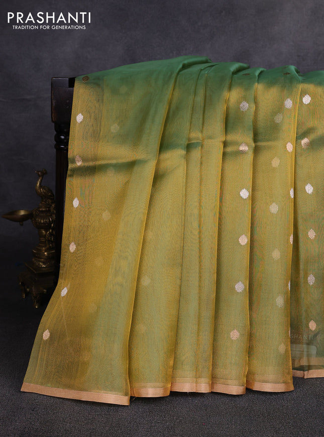 Banarasi tissue silk saree light green with allover silver & zari woven buttas and zari woven piping border