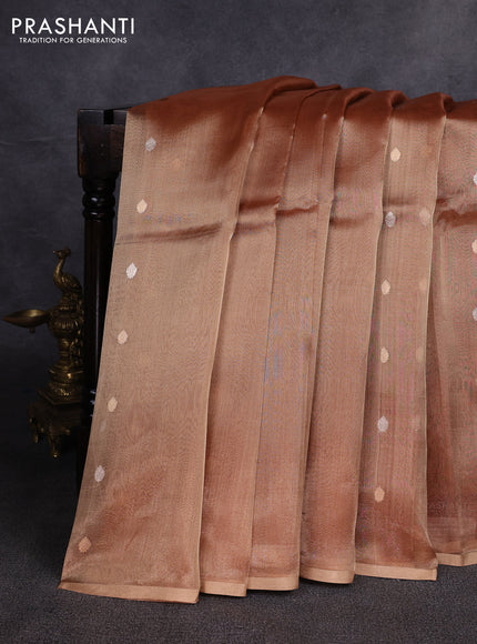 Banarasi tissue silk saree peach shade with allover silver & zari woven buttas and zari woven piping border