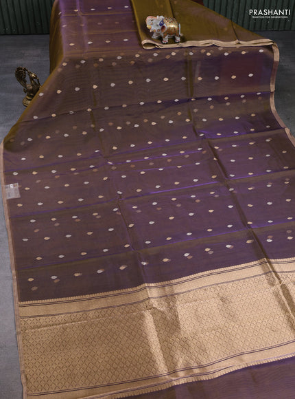 Banarasi tissue silk saree dual shade of mehendi green with allover silver & zari woven buttas and zari woven piping border