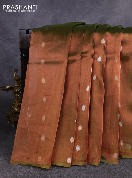 Banarasi tissue silk saree duall shade of green with allover silver & zari woven buttas and zari woven piping border