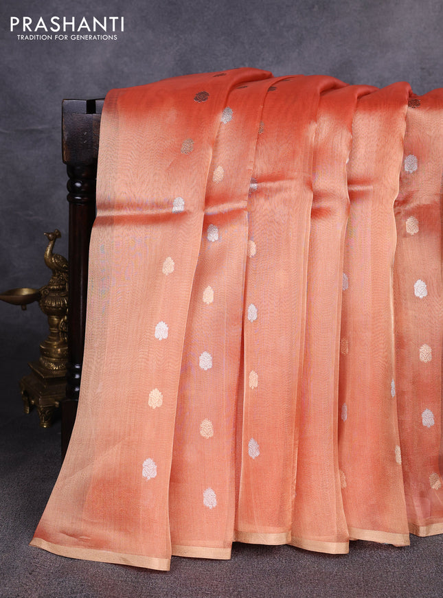 Banarasi tissue silk saree dual shade orange with allover silver & zari woven buttas and zari woven piping border
