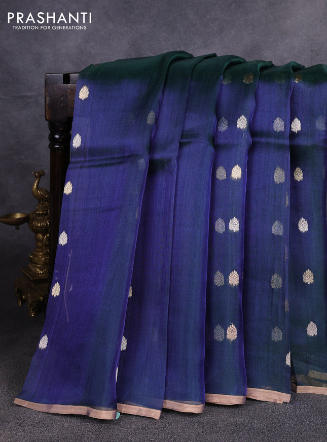 Banarasi tissue silk saree dual shade of bluish green with allover silver & zari woven buttas and zari woven piping border