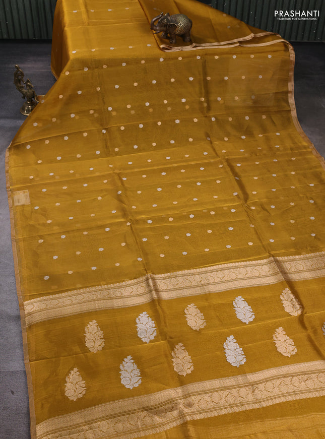 Banarasi tissue silk saree mustard yellow with allover silver & zari woven buttas and zari woven piping border