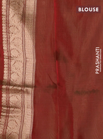 Banarasi tissue silk saree dual shade of reddish green with allover silver & zari woven buttas and zari woven piping border