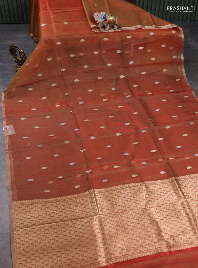 Banarasi tissue silk saree rust shade with allover silver & zari woven buttas and zari woven piping border