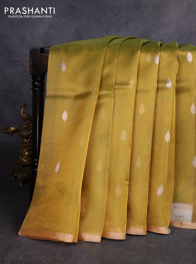 Banarasi tissue silk saree dual shade of mustard green with allover silver & zari woven buttas and zari woven piping border