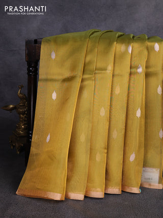 Banarasi tissue silk saree dual shade of mustard green with allover silver & zari woven buttas and zari woven piping border