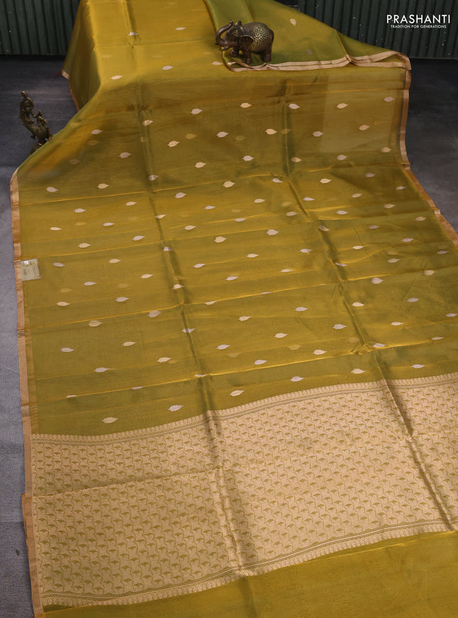 Banarasi tissue silk saree dual shade of mustard green with allover silver & zari woven buttas and zari woven piping border
