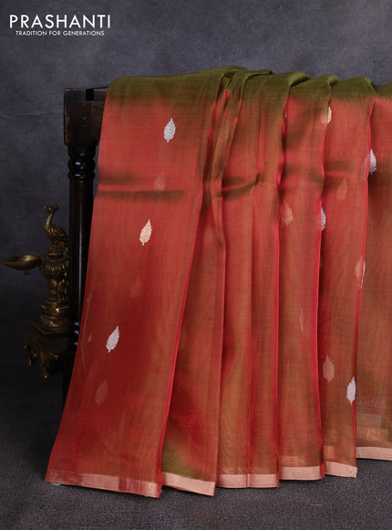 Banarasi tissue silk saree dual shade of manthulir green with allover silver & zari woven buttas and zari woven piping border