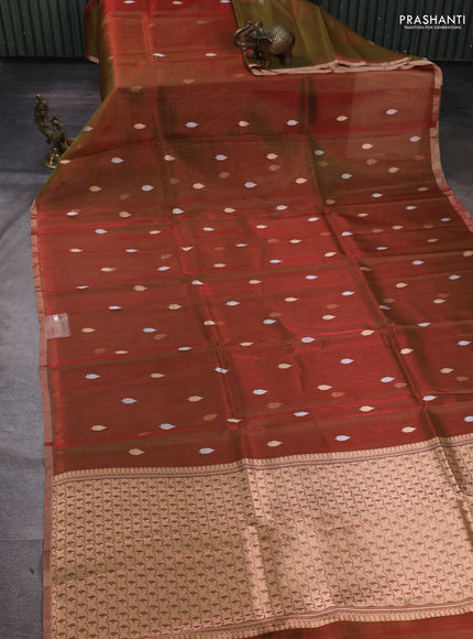 Banarasi tissue silk saree dual shade of manthulir green with allover silver & zari woven buttas and zari woven piping border
