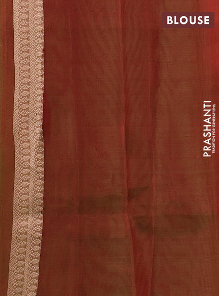 Banarasi tissue silk saree dual shade of manthulir green with allover silver & zari woven buttas and zari woven piping border