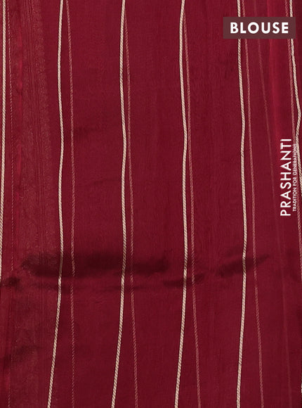 Banarasi tissue silk saree maroon with allover silver & zari woven floral buttas and zari woven piping border