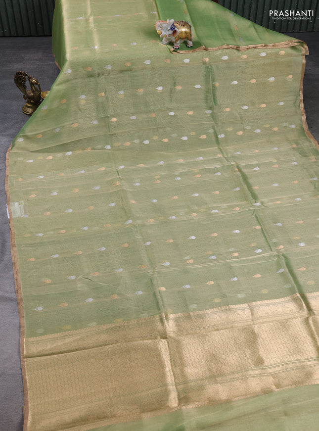 Banarasi tissue silk saree light green with allover silver & zari woven floral buttas and zari woven piping border