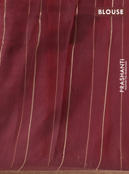 Banarasi tissue silk saree maroon with allover silver & zari woven floral buttas and zari woven piping border