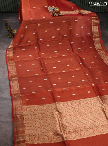 Banarasi tissue silk saree rust shade with allover silver & zari woven buttas and zari woven border