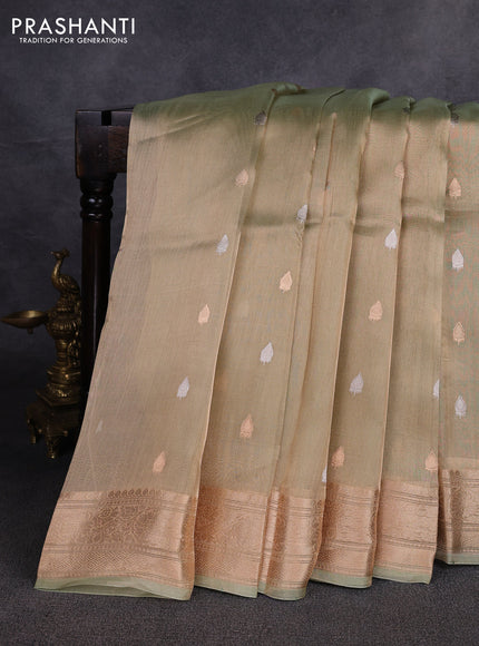 Banarasi tissue silk saree pista green with allover silver & zari woven buttas and zari woven border
