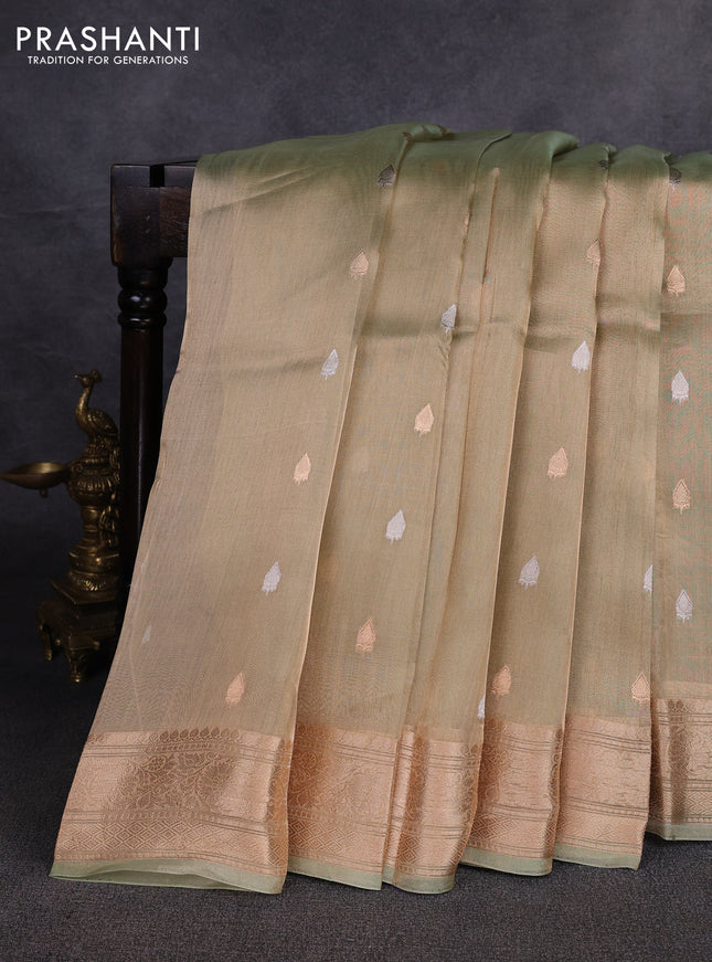 Banarasi tissue silk saree pista green with allover silver & zari woven buttas and zari woven border