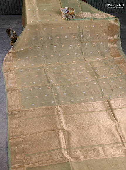 Banarasi tissue silk saree pista green with allover silver & zari woven buttas and zari woven border