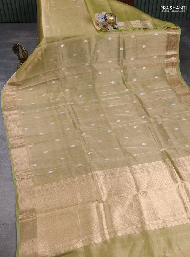 Banarasi tissue silk saree pista green with allover silver & zari woven buttas and zari woven border