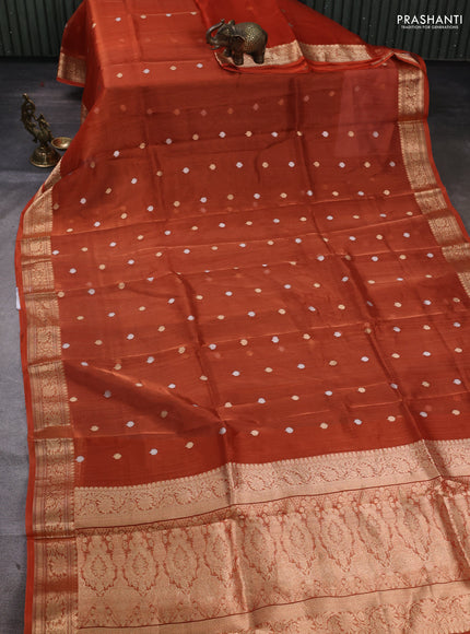 Banarasi tissue silk saree rustic orange with allover silver & zari woven buttas and zari woven border
