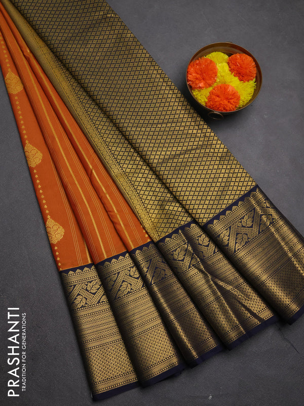 Semi kanchipuram silk saree dark mustard and navy blue with allover zari weaves & buttas and long zari woven korvai border