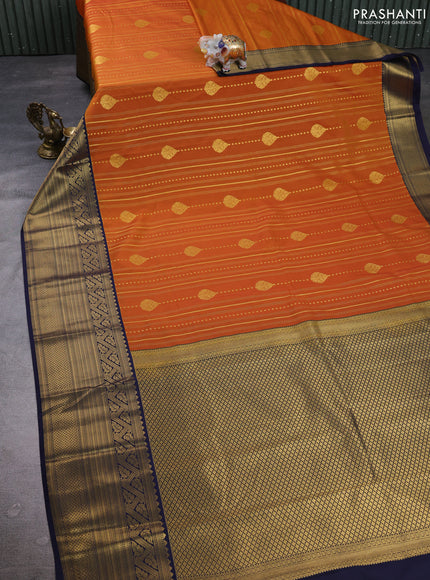 Semi kanchipuram silk saree dark mustard and navy blue with allover zari weaves & buttas and long zari woven korvai border