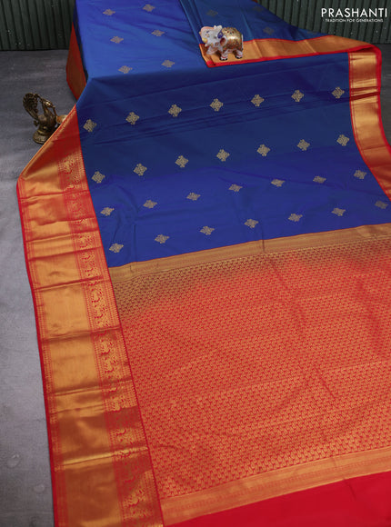 Semi kanchipuram silk saree dual shade of bluish green and red with zari woven buttas and long zari woven border